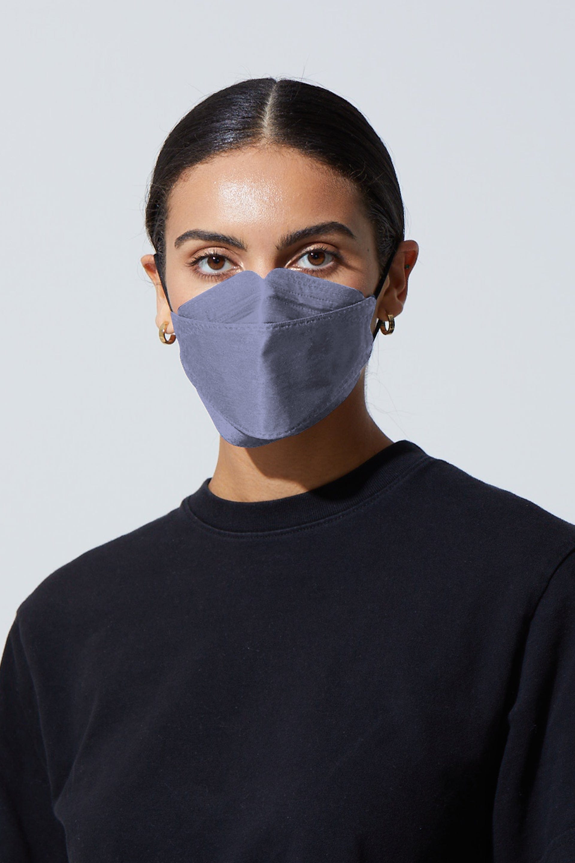 Woman wearing stylish Light Purple KF94 face mask, with high quality breathable fabric. 