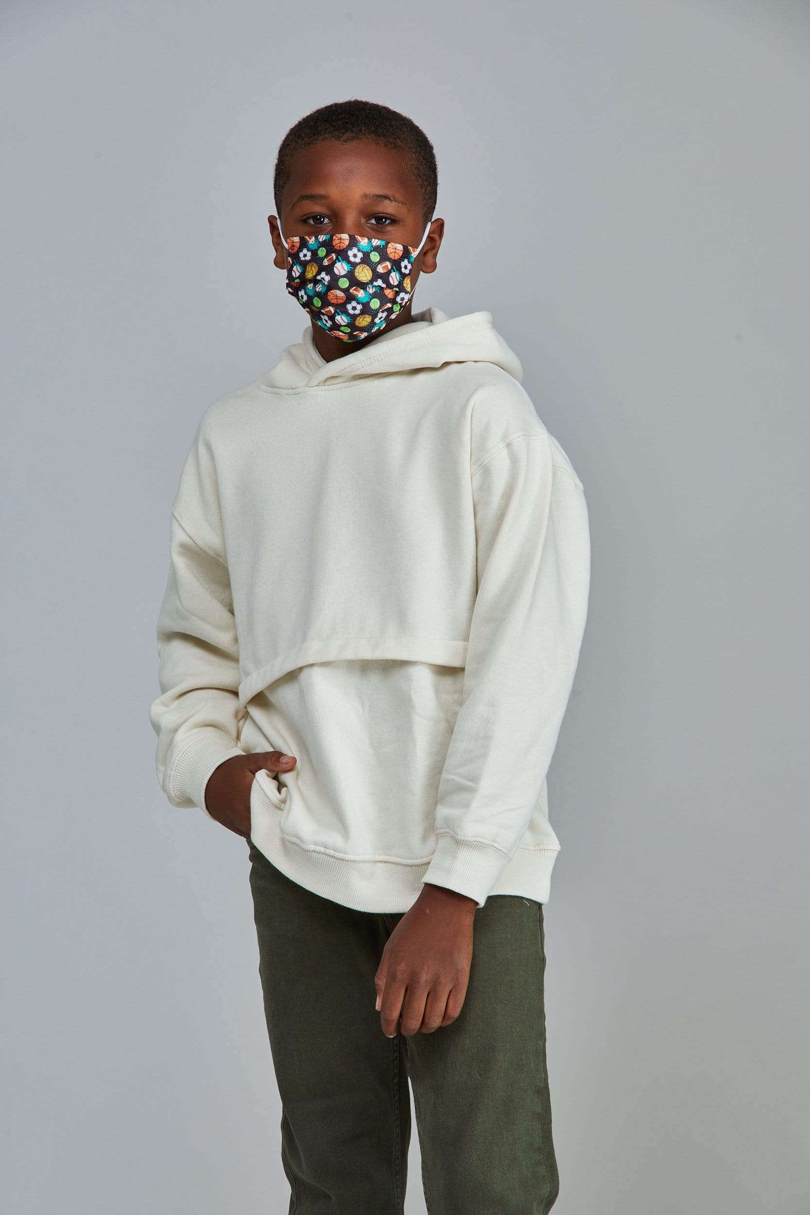 Child wearing stylish Sports Themed Pleated face mask, with three layers & high quality breathable fabric. 